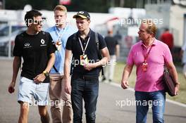 (L to R): Jolyon Palmer (GBR) Renault Sport F1 Team with his brother Will Palmer (GBR) and father Jonathan Palmer (GBR). 31.07.2016. Formula 1 World Championship, Rd 12, German Grand Prix, Hockenheim, Germany, Race Day.
