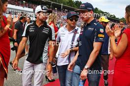 (L to R): Sergio Perez (MEX) Sahara Force India F1; Felipe Massa (BRA) Williams; and Max Verstappen (NLD) Red Bull Racing; on the drivers parade. 31.07.2016. Formula 1 World Championship, Rd 12, German Grand Prix, Hockenheim, Germany, Race Day.