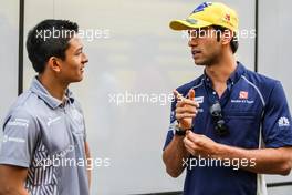 (L to R): Rio Haryanto (IDN) Manor Racing with Felipe Nasr (BRA) Sauber F1 Team. 28.07.2016. Formula 1 World Championship, Rd 12, German Grand Prix, Hockenheim, Germany, Preparation Day.