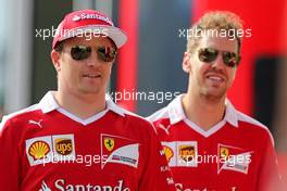 Kimi Raikkonen (FIN), Scuderia Ferrari and Sebastian Vettel (GER), Scuderia Ferrari  22.07.2016. Formula 1 World Championship, Rd 11, Hungarian Grand Prix, Budapest, Hungary, Practice Day.