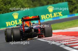 Daniel Ricciardo (AUS) Red Bull Racing RB12 sends sparks flying. 22.07.2016. Formula 1 World Championship, Rd 11, Hungarian Grand Prix, Budapest, Hungary, Practice Day.