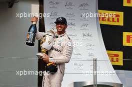 Race winner Lewis Hamilton (GBR) Mercedes AMG F1 celebrates on the podium. 24.07.2016. Formula 1 World Championship, Rd 11, Hungarian Grand Prix, Budapest, Hungary, Race Day.