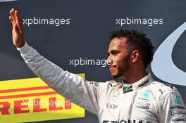 Race winner Lewis Hamilton (GBR) Mercedes AMG F1 celebrates on the podium. 24.07.2016. Formula 1 World Championship, Rd 11, Hungarian Grand Prix, Budapest, Hungary, Race Day.
