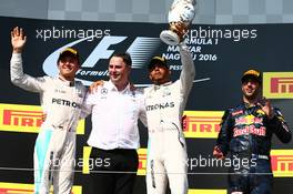 1st place Lewis Hamilton (GBR) Mercedes AMG F1 W07 , 2nd Nico Rosberg (GER) Mercedes AMG Petronas F1 W07 and 3rd Daniel Ricciardo (AUS) Red Bull Racing RB12. 24.07.2016. Formula 1 World Championship, Rd 11, Hungarian Grand Prix, Budapest, Hungary, Race Day.