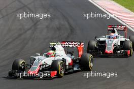 Esteban Gutierrez (MEX) Haas F1 Team VF-16 leads team mate Romain Grosjean (FRA) Haas F1 Team VF-16. 24.07.2016. Formula 1 World Championship, Rd 11, Hungarian Grand Prix, Budapest, Hungary, Race Day.