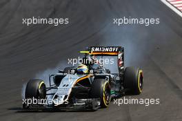 Sergio Perez (MEX) Sahara Force India F1 VJM09 locks up under braking. 24.07.2016. Formula 1 World Championship, Rd 11, Hungarian Grand Prix, Budapest, Hungary, Race Day.