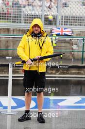Andy Stobart (GBR) Renault Sport F1 Team Press Officer as a rain storm hits the circuit before qualifying. 23.07.2016. Formula 1 World Championship, Rd 11, Hungarian Grand Prix, Budapest, Hungary, Qualifying Day.