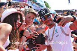 Lewis Hamilton (GBR) Mercedes AMG F1 with fans. 23.07.2016. Formula 1 World Championship, Rd 11, Hungarian Grand Prix, Budapest, Hungary, Qualifying Day.