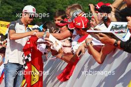Esteban Gutierrez (MEX) Haas F1 Team signs autographs for the fans. 23.07.2016. Formula 1 World Championship, Rd 11, Hungarian Grand Prix, Budapest, Hungary, Qualifying Day.