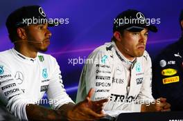 (L to R): Lewis Hamilton (GBR) Mercedes AMG F1 and team mate Nico Rosberg (GER) Mercedes AMG F1 in the FIA Press Conference. 23.07.2016. Formula 1 World Championship, Rd 11, Hungarian Grand Prix, Budapest, Hungary, Qualifying Day.