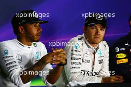 (L to R): Lewis Hamilton (GBR) Mercedes AMG F1 and team mate Nico Rosberg (GER) Mercedes AMG F1 in the FIA Press Conference. 23.07.2016. Formula 1 World Championship, Rd 11, Hungarian Grand Prix, Budapest, Hungary, Qualifying Day.