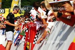 Jolyon Palmer (GBR) Renault Sport F1 Team signs autographs for the fans. 23.07.2016. Formula 1 World Championship, Rd 11, Hungarian Grand Prix, Budapest, Hungary, Qualifying Day.