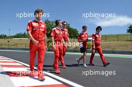 Sebastian Vettel (GER) Ferrari walks the circuit with the team. 21.07.2016. Formula 1 World Championship, Rd 11, Hungarian Grand Prix, Budapest, Hungary, Preparation Day.