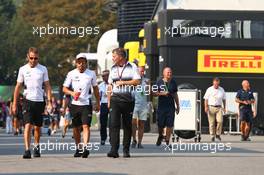 (L to R): Jenson Button (GBR) McLaren with Fernando Alonso (ESP) McLaren and Dave Redding (GBR) McLaren Sporting Director. 02.09.2016. Formula 1 World Championship, Rd 14, Italian Grand Prix, Monza, Italy, Practice Day.