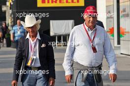 (L to R): Arturo Merzario (ITA) with Niki Lauda (AUT) Mercedes Non-Executive Chairman. 02.09.2016. Formula 1 World Championship, Rd 14, Italian Grand Prix, Monza, Italy, Practice Day.