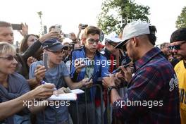 Lewis Hamilton (GBR) Mercedes AMG F1 signs autographs for the fans. 02.09.2016. Formula 1 World Championship, Rd 14, Italian Grand Prix, Monza, Italy, Practice Day.