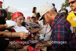 Lewis Hamilton (GBR) Mercedes AMG F1 signs autographs for the fans. 02.09.2016. Formula 1 World Championship, Rd 14, Italian Grand Prix, Monza, Italy, Practice Day.