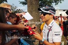 Felipe Massa (BRA) Williams signs autographs for the fans. 02.09.2016. Formula 1 World Championship, Rd 14, Italian Grand Prix, Monza, Italy, Practice Day.