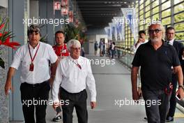 Pasquale Lattuneddu (ITA) of the FOM with Bernie Ecclestone (GBR) and Flavio Briatore (ITA). 02.09.2016. Formula 1 World Championship, Rd 14, Italian Grand Prix, Monza, Italy, Practice Day.
