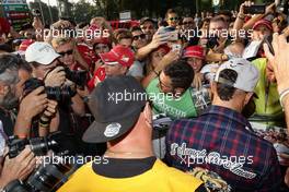 Lewis Hamilton (GBR) Mercedes AMG F1 signs autographs for the fans. 02.09.2016. Formula 1 World Championship, Rd 14, Italian Grand Prix, Monza, Italy, Practice Day.