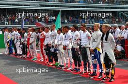 The drivers as the grid observes the national anthem. 04.09.2016. Formula 1 World Championship, Rd 14, Italian Grand Prix, Monza, Italy, Race Day.