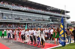 The drivers as the grid observes the national anthem. 04.09.2016. Formula 1 World Championship, Rd 14, Italian Grand Prix, Monza, Italy, Race Day.
