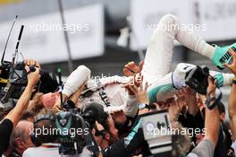 Race winner Nico Rosberg (GER) Mercedes AMG F1 celebrates with the team in parc ferme. 04.09.2016. Formula 1 World Championship, Rd 14, Italian Grand Prix, Monza, Italy, Race Day.