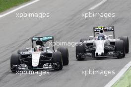 Lewis Hamilton (GBR) Mercedes AMG F1 W07 Hybrid and Valtteri Bottas (FIN) Williams FW38 battle for position. 04.09.2016. Formula 1 World Championship, Rd 14, Italian Grand Prix, Monza, Italy, Race Day.
