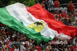 A large Italian flag held by fans in the grandstand. 04.09.2016. Formula 1 World Championship, Rd 14, Italian Grand Prix, Monza, Italy, Race Day.