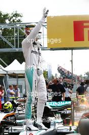 Lewis Hamilton (GBR) Mercedes AMG F1 W07 Hybrid celebrates his pole position in parc ferme. 03.09.2016. Formula 1 World Championship, Rd 14, Italian Grand Prix, Monza, Italy, Qualifying Day.