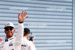 Lewis Hamilton (GBR) Mercedes AMG F1 celebrates his pole position in parc ferme. 03.09.2016. Formula 1 World Championship, Rd 14, Italian Grand Prix, Monza, Italy, Qualifying Day.