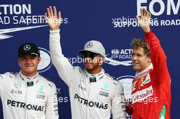 Qualifying top three in parc ferme (L to R): Nico Rosberg (GER) Mercedes AMG F1, second; Lewis Hamilton (GBR) Mercedes AMG F1, pole position; Sebastian Vettel (GER) Ferrari, third. 03.09.2016. Formula 1 World Championship, Rd 14, Italian Grand Prix, Monza, Italy, Qualifying Day.