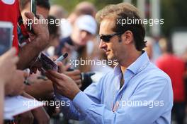 Jarno Trulli (ITA) signs autographs for the fans. 03.09.2016. Formula 1 World Championship, Rd 14, Italian Grand Prix, Monza, Italy, Qualifying Day.