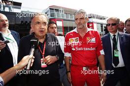 (L to R): Sergio Marchionne (ITA), Ferrari President and CEO of Fiat Chrysler Automobiles with Maurizio Arrivabene (ITA) Ferrari Team Principal. 03.09.2016. Formula 1 World Championship, Rd 14, Italian Grand Prix, Monza, Italy, Qualifying Day.