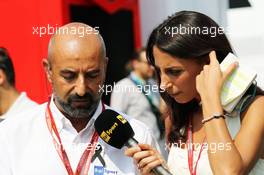 (L to R): Ivan Capelli (ITA) President of ACI Milano with Giorgia Cardinaletti (ITA) RAI Television Presenter. 03.09.2016. Formula 1 World Championship, Rd 14, Italian Grand Prix, Monza, Italy, Qualifying Day.