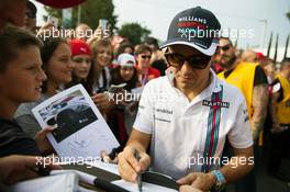 Felipe Massa (BRA) Williams signs autographs for the fans. 03.09.2016. Formula 1 World Championship, Rd 14, Italian Grand Prix, Monza, Italy, Qualifying Day.