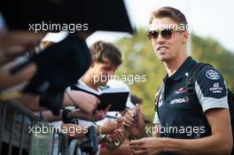 Daniil Kvyat (RUS) Scuderia Toro Rosso signs autographs for the fans. 03.09.2016. Formula 1 World Championship, Rd 14, Italian Grand Prix, Monza, Italy, Qualifying Day.