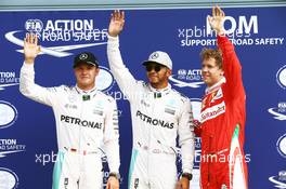 Qualifying top three in parc ferme (L to R): Nico Rosberg (GER) Mercedes AMG F1, second; Lewis Hamilton (GBR) Mercedes AMG F1, pole position; Sebastian Vettel (GER) Ferrari, third. 03.09.2016. Formula 1 World Championship, Rd 14, Italian Grand Prix, Monza, Italy, Qualifying Day.