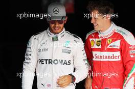 (L to R): Pole sitter Lewis Hamilton (GBR) Mercedes AMG F1 with third placed Sebastian Vettel (GER) Ferrari in parc ferme. 03.09.2016. Formula 1 World Championship, Rd 14, Italian Grand Prix, Monza, Italy, Qualifying Day.