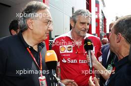 (L to R): Sergio Marchionne (ITA), Ferrari President and CEO of Fiat Chrysler Automobiles with Maurizio Arrivabene (ITA) Ferrari Team Principal. 03.09.2016. Formula 1 World Championship, Rd 14, Italian Grand Prix, Monza, Italy, Qualifying Day.