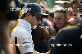 Felipe Massa (BRA) Williams signs autographs for the fans. 03.09.2016. Formula 1 World Championship, Rd 14, Italian Grand Prix, Monza, Italy, Qualifying Day.