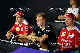The FIA Press Conference (L to R): Sebastian Vettel (GER) Ferrari with Kevin Magnussen (DEN) Renault Sport F1 Team and Kimi Raikkonen (FIN) Ferrari. 01.09.2016. Formula 1 World Championship, Rd 14, Italian Grand Prix, Monza, Italy, Preparation Day.