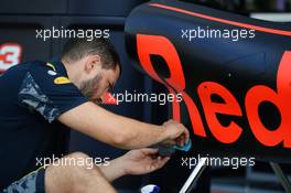 Red Bull Racing RB12 worked on by a mechanic. 01.09.2016. Formula 1 World Championship, Rd 14, Italian Grand Prix, Monza, Italy, Preparation Day.