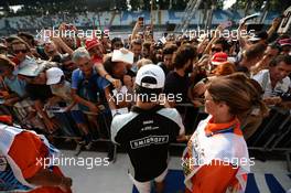 Sergio Perez (MEX) Sahara Force India F1 signs autographs for the fans. 01.09.2016. Formula 1 World Championship, Rd 14, Italian Grand Prix, Monza, Italy, Preparation Day.