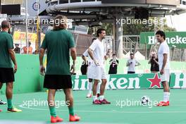 Jolyon Palmer (GBR) Renault Sport F1 Team and Sergio Perez (MEX) Sahara Force India F1 at the charity 5-a-side football match. 01.09.2016. Formula 1 World Championship, Rd 14, Italian Grand Prix, Monza, Italy, Preparation Day.