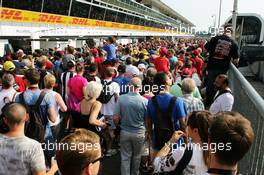 Fans in the pit lane. 01.09.2016. Formula 1 World Championship, Rd 14, Italian Grand Prix, Monza, Italy, Preparation Day.