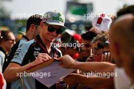 Nico Hulkenberg (GER) Sahara Force India F1 signs autographs for the fans. 01.09.2016. Formula 1 World Championship, Rd 14, Italian Grand Prix, Monza, Italy, Preparation Day.