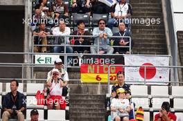 Fans in the grandstand and a banner for Nico Hulkenberg (GER) Sahara Force India F1. 07.10.2016. Formula 1 World Championship, Rd 17, Japanese Grand Prix, Suzuka, Japan, Practice Day.