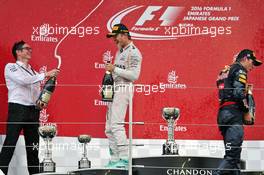 The podium (L to R): Andrew Shovlin (GBR) Mercedes AMG F1 Engineer celebrates with race winner Nico Rosberg (GER) Mercedes AMG F1; second placed Max Verstappen (NLD) Red Bull Racing. 09.10.2016. Formula 1 World Championship, Rd 17, Japanese Grand Prix, Suzuka, Japan, Race Day.