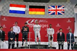 The podium (L to R): Max Verstappen (NLD) Red Bull Racing, second; Daniel Ricciardo (AUS) Red Bull Racing, race winner; Nico Rosberg (GER) Mercedes AMG F1, third. 09.10.2016. Formula 1 World Championship, Rd 17, Japanese Grand Prix, Suzuka, Japan, Race Day.